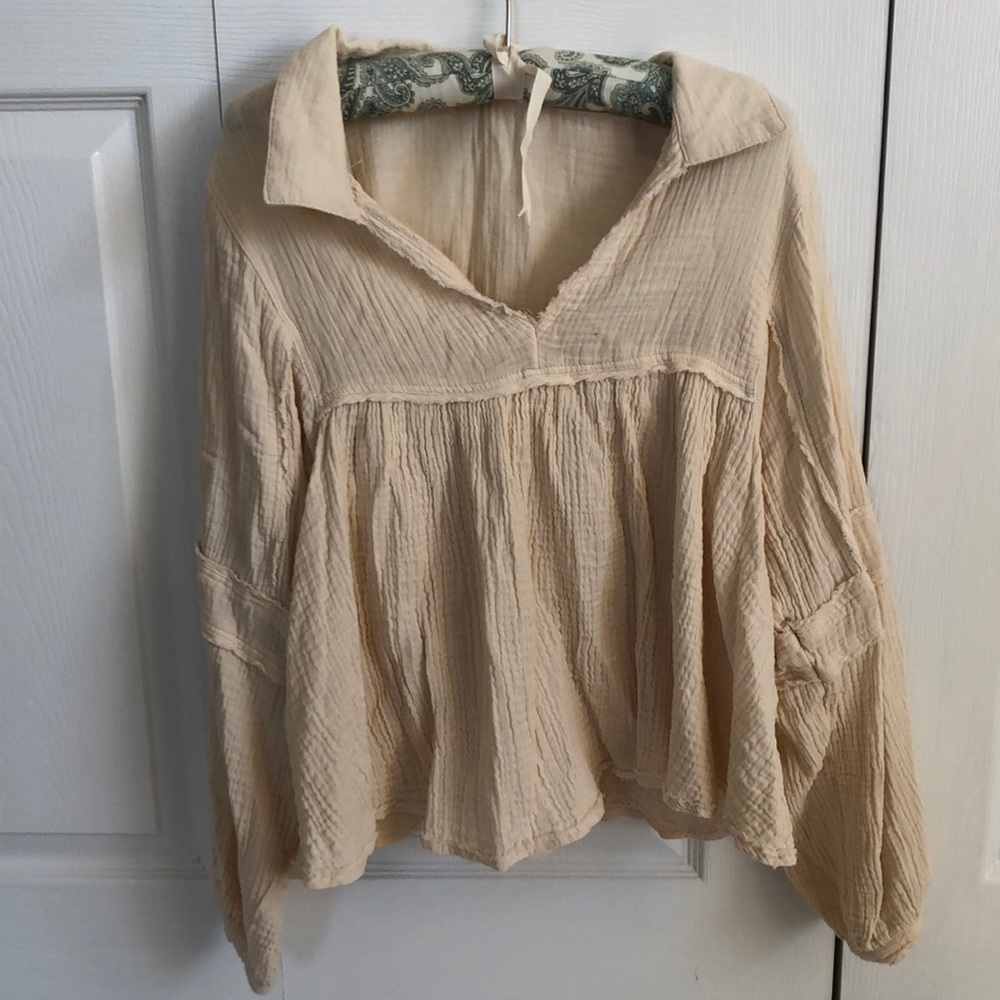Cream-colored flowy long sleeve Blouse
